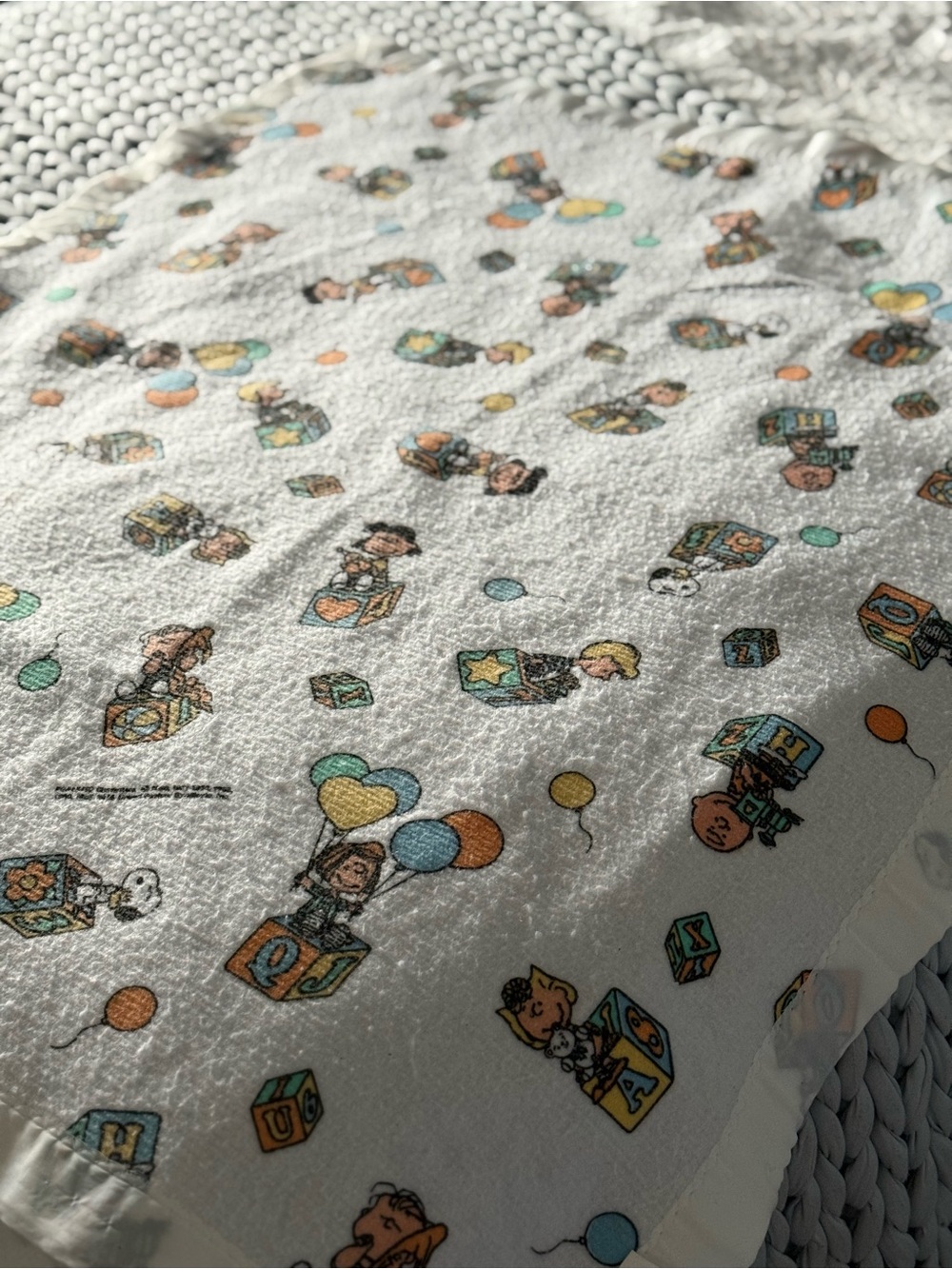 Rare Peanuts fleece with nylon style trim baby blanket made in Canada by Esmond.